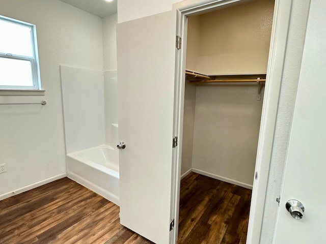 bathroom with hardwood / wood-style flooring