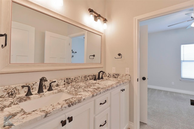 bathroom featuring vanity and ceiling fan