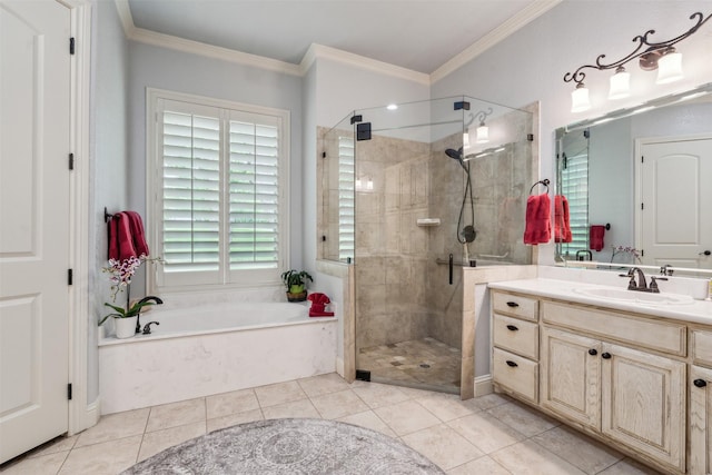 bathroom featuring vanity, tile patterned floors, a garden tub, and a shower stall