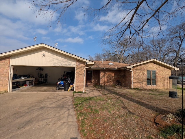 ranch-style house featuring a garage