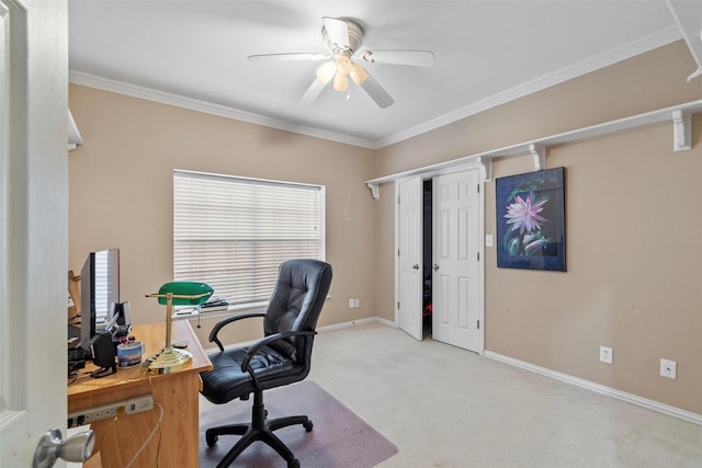 carpeted office space featuring crown molding and ceiling fan