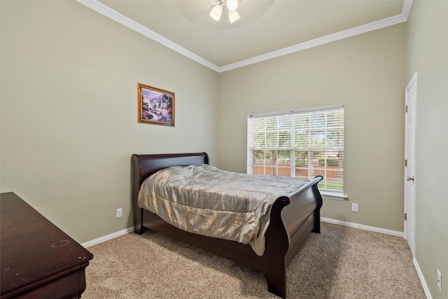 bedroom featuring ornamental molding, light carpet, and ceiling fan