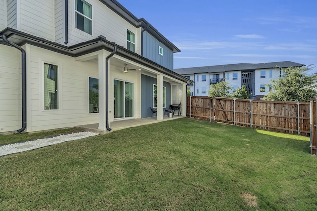 2125 Bird St, Fort Worth, TX 76111 - rear view of property featuring a patio area, a fenced backyard, and a ceiling fan