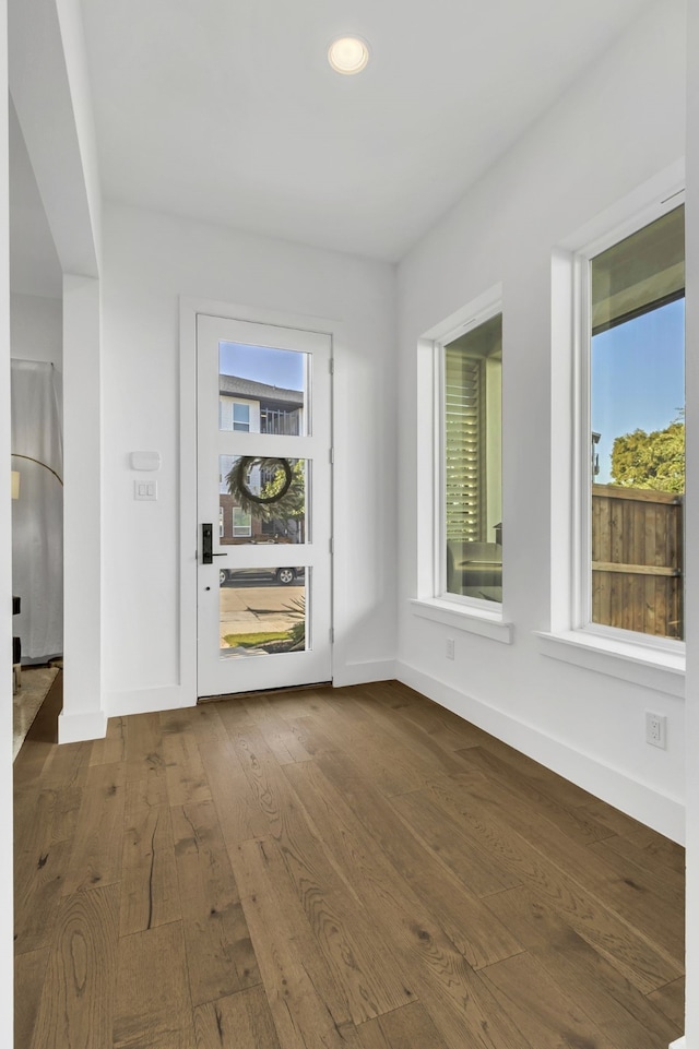 2125 Bird St, Fort Worth, TX 76111 - empty room with dark wood-style flooring and recessed lighting