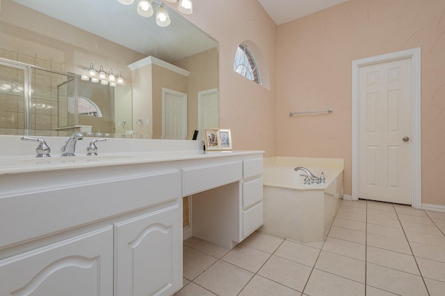 bathroom with tile patterned flooring, vanity, and separate shower and tub