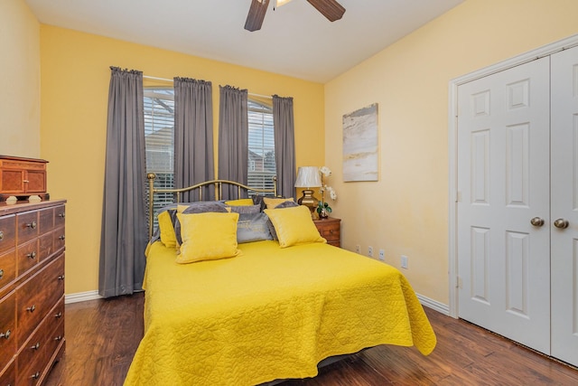 bedroom featuring ceiling fan and dark hardwood / wood-style floors