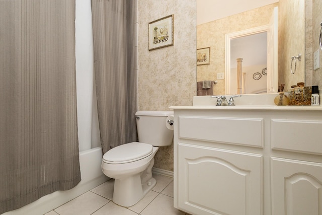 full bathroom featuring tile patterned flooring, shower / bath combo, vanity, and toilet