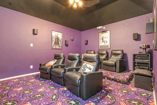 home theater featuring ceiling fan and carpet flooring