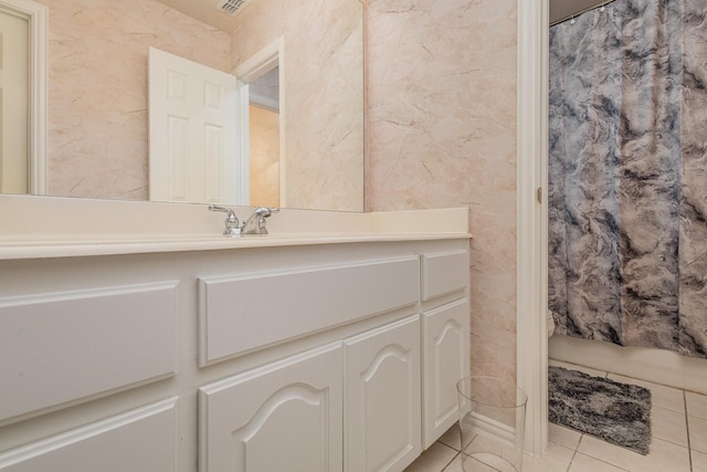 bathroom with vanity and tile patterned flooring