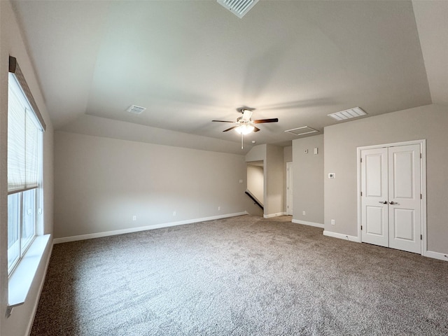 empty room with carpet and ceiling fan