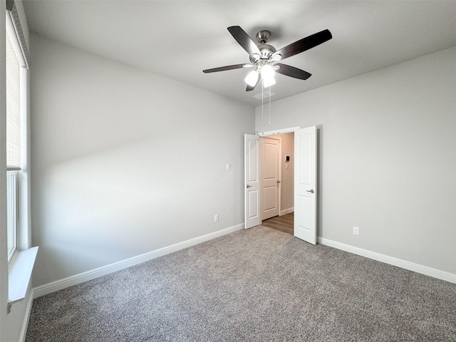 unfurnished bedroom with carpet and ceiling fan