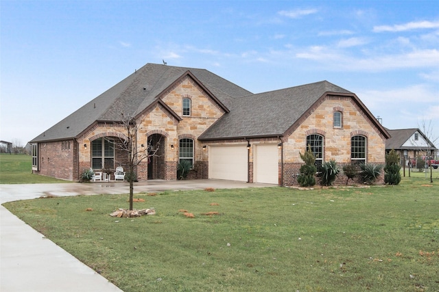 french provincial home featuring a front lawn