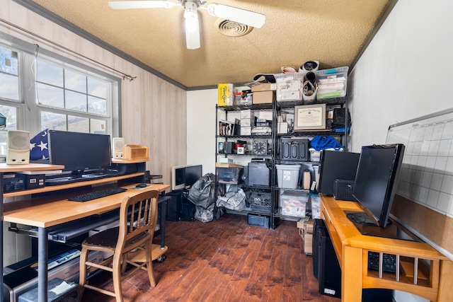 office featuring crown molding, ceiling fan, dark hardwood / wood-style flooring, and a textured ceiling