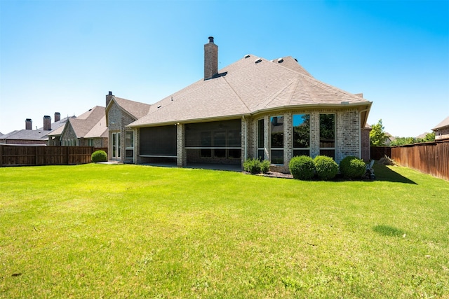3019 Haywick, The Colony, TX 75056 - back of property featuring brick siding and a sunroom