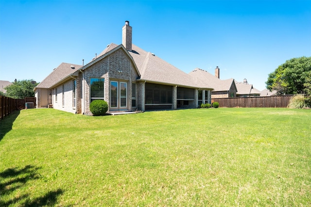 3019 Haywick, The Colony, TX 75056 - back of property with brick siding and a chimney