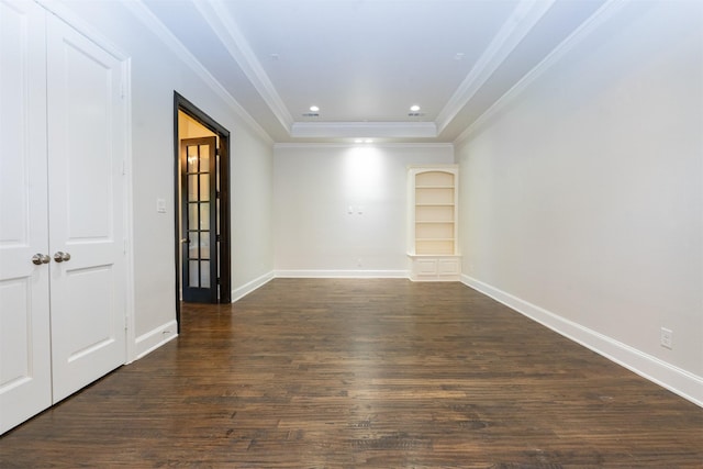 3019 Haywick, The Colony, TX 75056 - unfurnished room with dark wood-style flooring, ornamental molding, baseboards, recessed lighting, and a tray ceiling