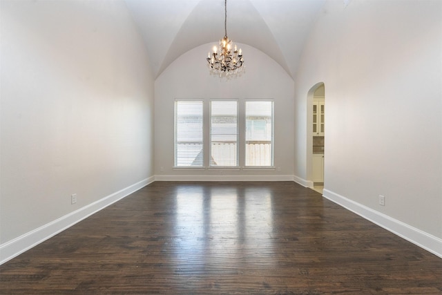 3019 Haywick, The Colony, TX 75056 - empty room featuring arched walkways, baseboards, lofted ceiling, and dark wood-style flooring