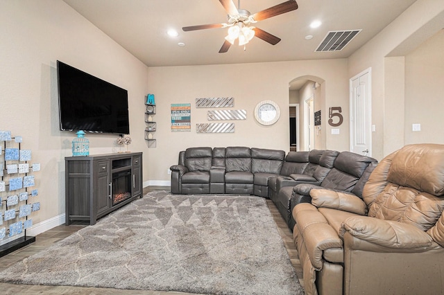 living room featuring ceiling fan