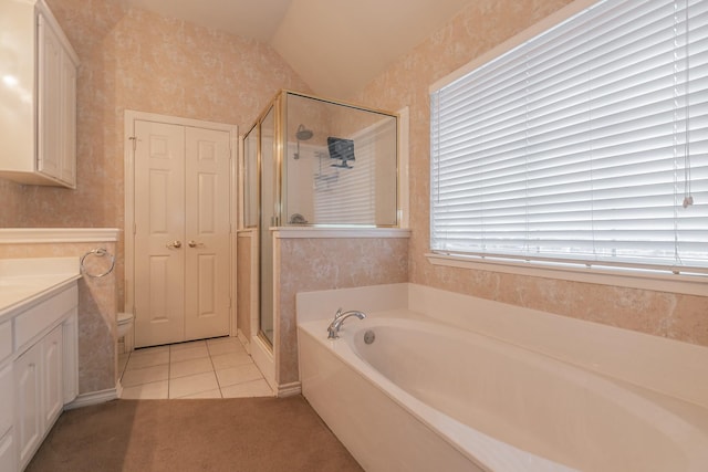 full bath with a shower stall, tile patterned floors, vanity, and wallpapered walls