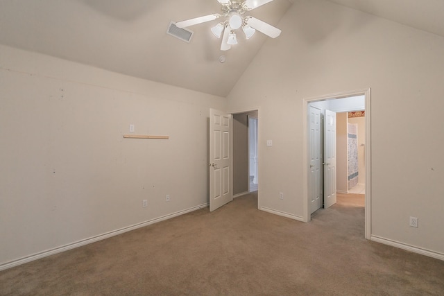 unfurnished bedroom featuring visible vents, carpet flooring, ceiling fan, high vaulted ceiling, and baseboards