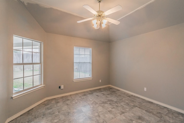 unfurnished room featuring lofted ceiling, ceiling fan, and baseboards