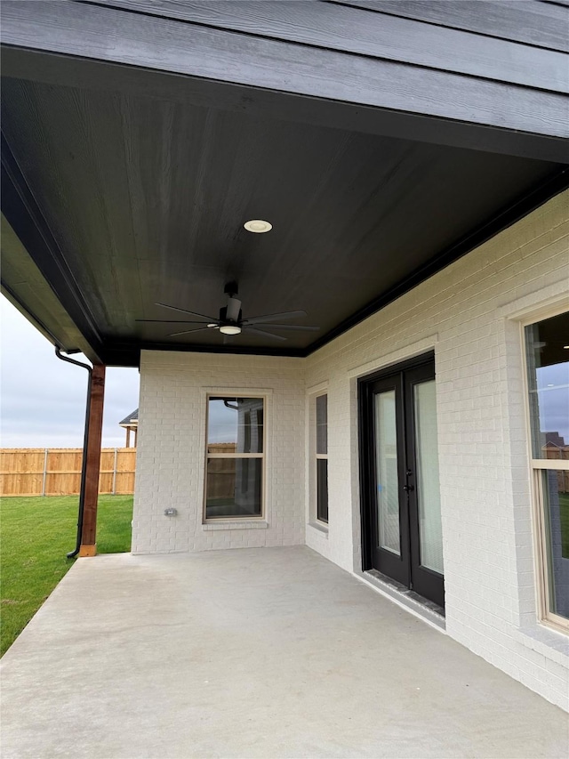 view of patio featuring ceiling fan