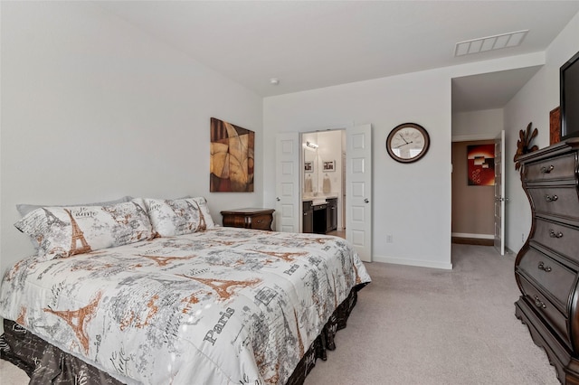 bedroom with light colored carpet