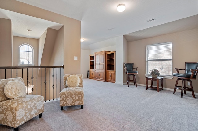 sitting room featuring carpet floors