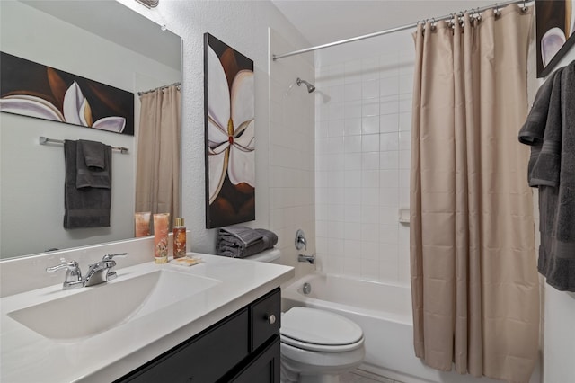 full bathroom featuring toilet, vanity, and shower / bath combo with shower curtain