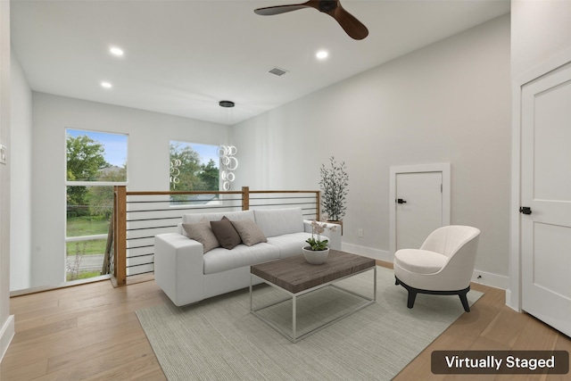 living room with light hardwood / wood-style floors