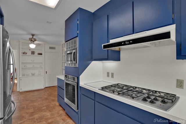 kitchen featuring blue cabinetry, ceiling fan, and stainless steel appliances