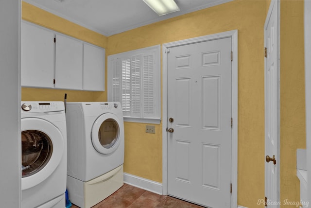 laundry area with cabinets and separate washer and dryer