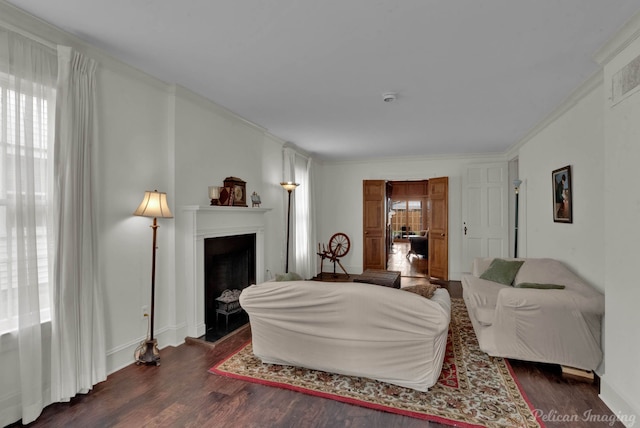 living room featuring crown molding and dark hardwood / wood-style floors