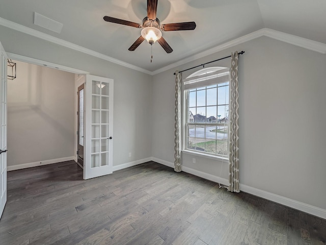 spare room with lofted ceiling, crown molding, ceiling fan, hardwood / wood-style floors, and french doors