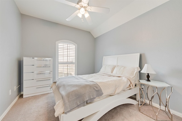 carpeted bedroom with lofted ceiling and ceiling fan