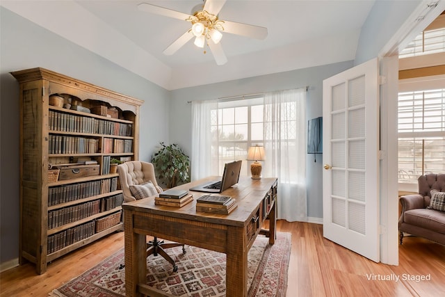 office area featuring ceiling fan, a healthy amount of sunlight, and light wood-type flooring