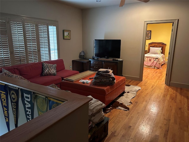 1434 Lakeside Trl, Whitney, TX 76692 - living room featuring light hardwood / wood-style floors and ceiling fan