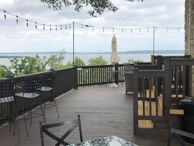 1434 Lakeside Trl, Whitney, TX 76692 - wooden terrace featuring a water view