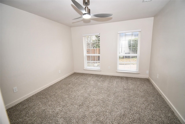 carpeted empty room with ceiling fan