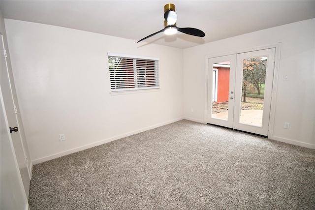 unfurnished room with french doors, carpet flooring, and ceiling fan