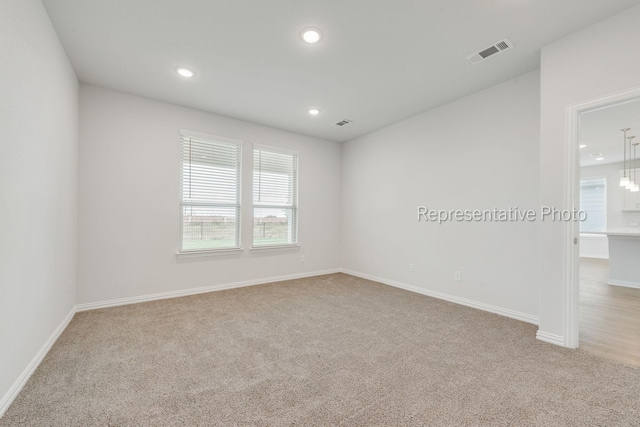 view of carpeted spare room