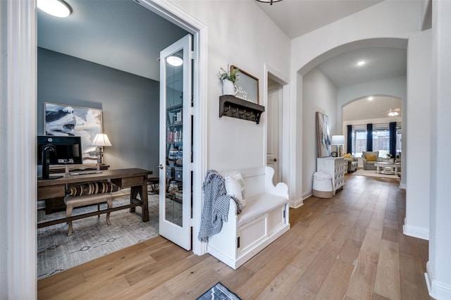 hallway featuring light wood-type flooring