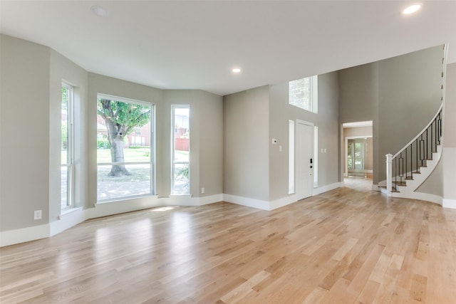 unfurnished living room with light hardwood / wood-style floors