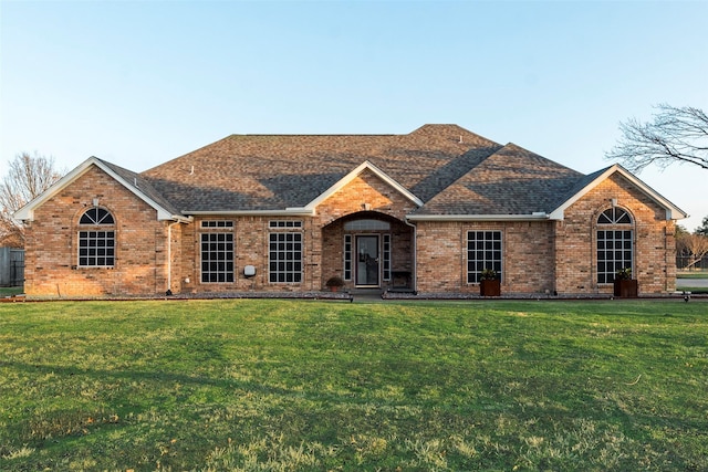 view of front of house with a front lawn