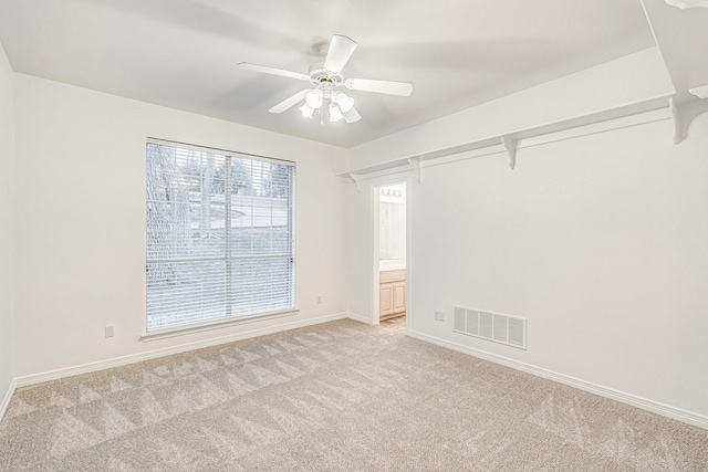 4781 Joe Wilson Rd, Midlothian, TX 76065 - spare room with light carpet, ceiling fan, and baseboards