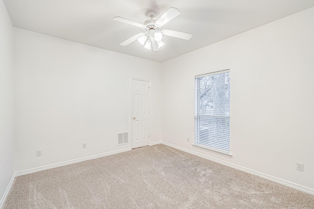 4781 Joe Wilson Rd, Midlothian, TX 76065 - empty room featuring light colored carpet, baseboards, and ceiling fan
