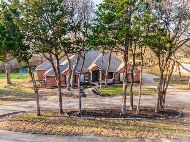 4781 Joe Wilson Rd, Midlothian, TX 76065 - view of front of home with concrete driveway and covered porch