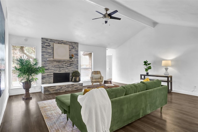 living room featuring lofted ceiling with beams, ceiling fan, dark hardwood / wood-style floors, and a fireplace