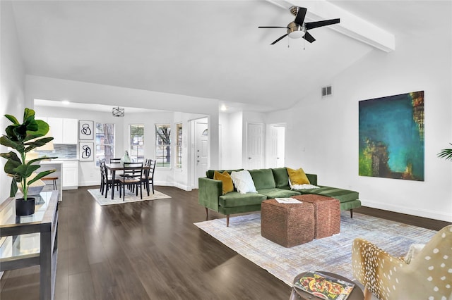 living room with ceiling fan, dark hardwood / wood-style flooring, and vaulted ceiling with beams