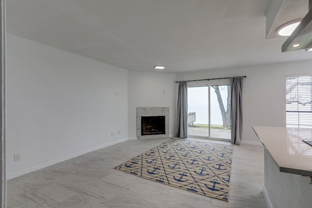 living room featuring a fireplace